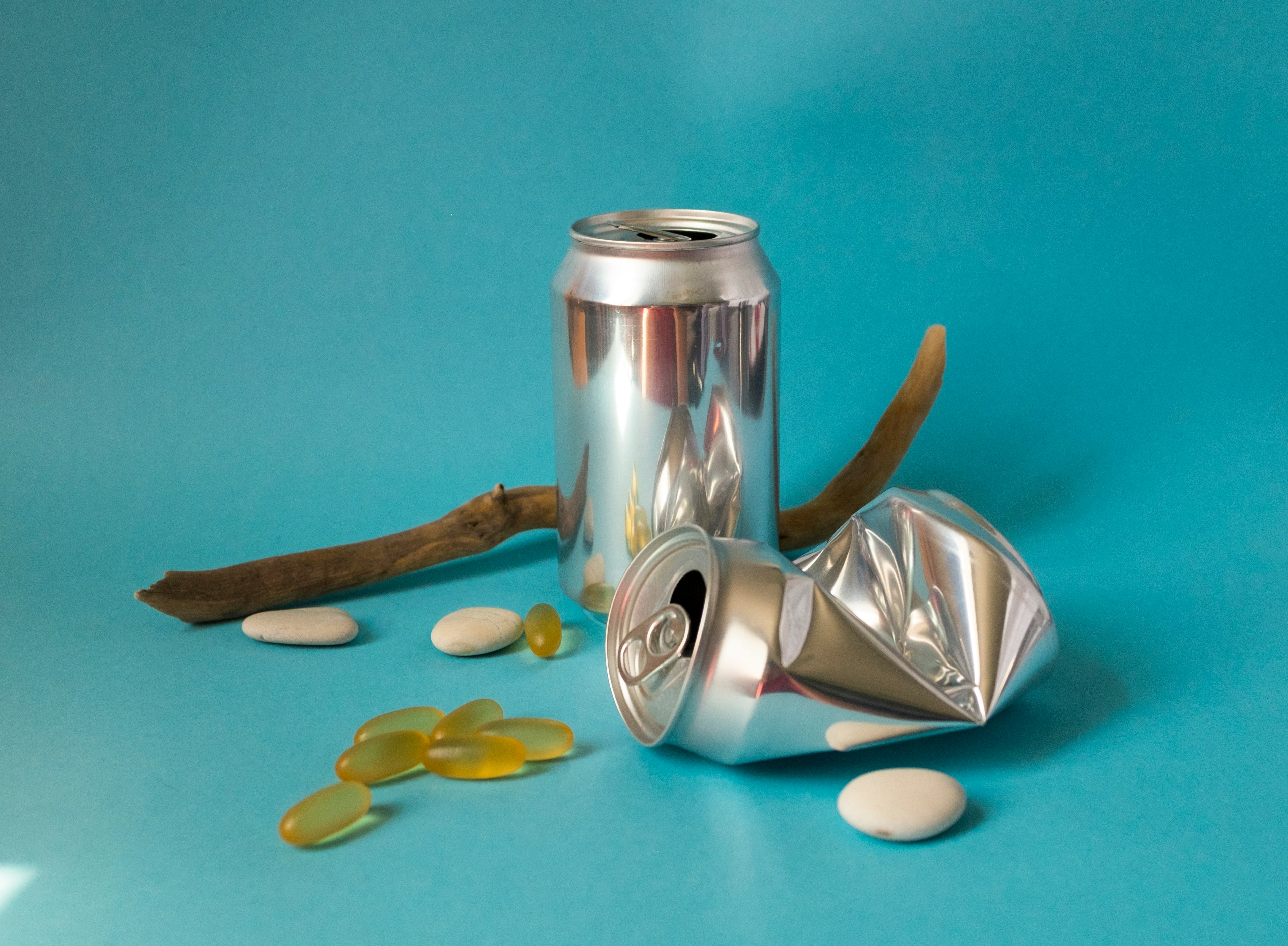 stainless steel vacuum flask on teal textile